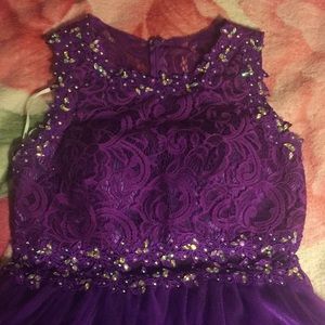 A purple beaded lace/mesh dress